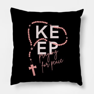 Keep Praying for Peace typography and rosary beads Pillow