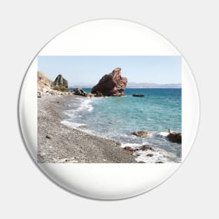 Shoreline with pebbles and blue water Pin