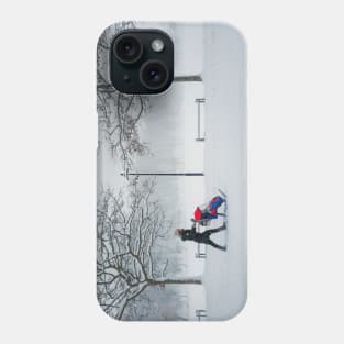 mom walks her baby in the snow Phone Case