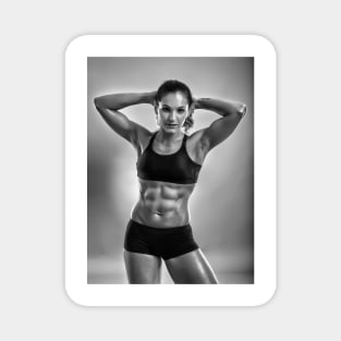 Fitness woman posing in studio Magnet