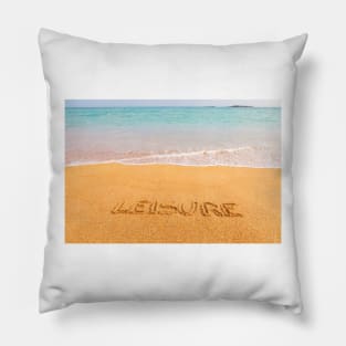 Inscription "LEISURE" made on beautiful beach by the blue sea Pillow