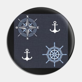 Pattern of anchors and compass roses on dark blue Pin