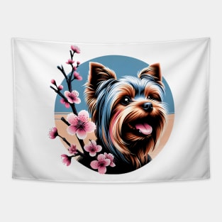 Yorkshire Terrier Enjoys Spring Amid Cherry Blossoms Tapestry