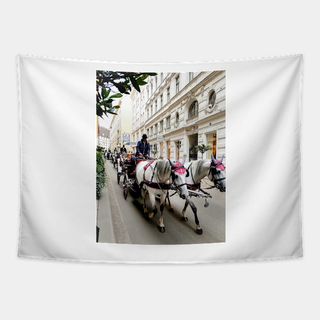 White horses adorned in formal regalia pulling carriages in city street. Tapestry by brians101