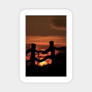 Wooden Fence with a colorful Kansas Sunset Magnet