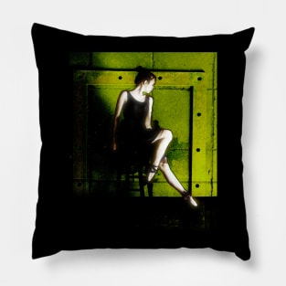 Beautiful girl, ballet dancer, near the concrete wall with iron plate. Roughness and tenderness. Pillow