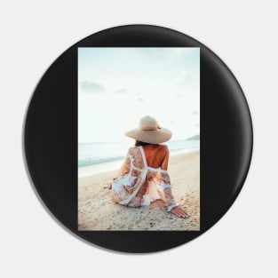 Elegant Woman Sitting on Beach and Watching the Ocean Pin