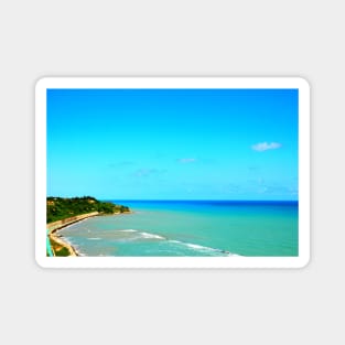 View of green vegetation of the Adriatic coastline with serene blue sea in Ortona Magnet