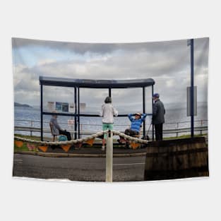 People chatting around a bus shelter - Lochranza, Scotland Tapestry