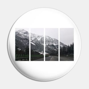 A shot on the move from the windshield of an electric car with a snow-covered alps mountain in front of it in a cold cloudy winter day. POV first person view shot on a mountain highway. Pin