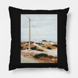 Bird Sitting on Telephone Pole in Dry North African Countryside Pillow