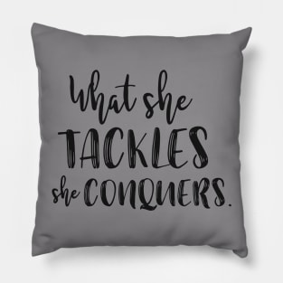 What she tackles, she conquers Pillow