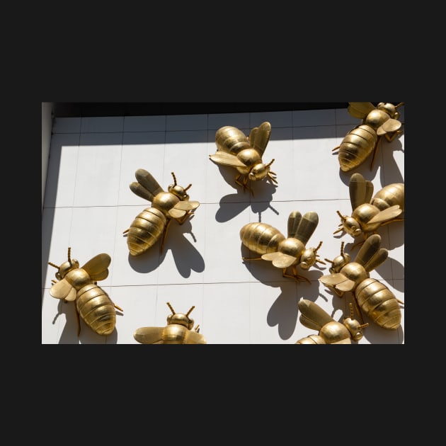 Gold bees on Eureka Tower, Melbourne, Australia. by sma1050