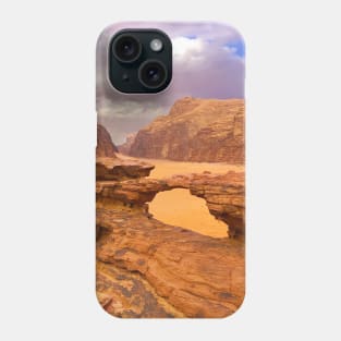 Rock formation with natural arch in the Wadi Rum desert, Jordan Phone Case