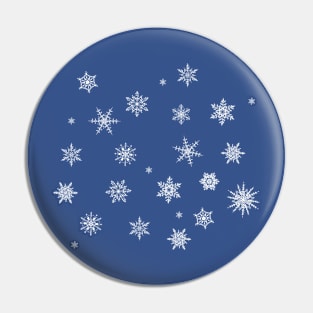 Snowflakes on blue background Pin