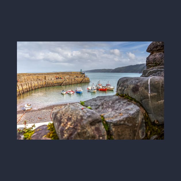 Clovelly Stone Wall And Fishing Boats, Devon, England by tommysphotos