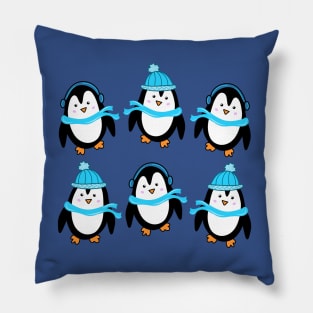 Festive Winter Penguins with Blue Scarves and Hats on a Dark Blue Backdrop, made by EndlessEmporium Pillow