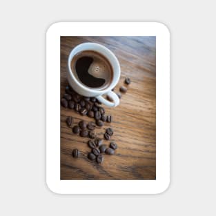 Espresso and beans on a table Magnet