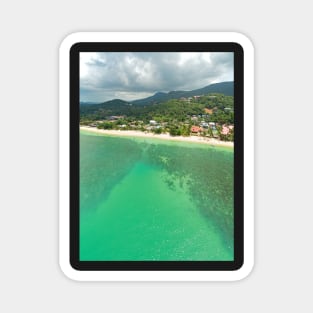 Aerial panoramic view of ocean, beach and blue cloudy sky Magnet