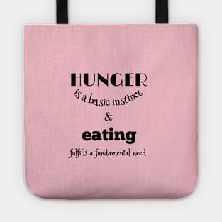 Hunger is a basic instinct, and eating fulfills a fundamental need black writting) Tote