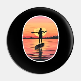 Paddleboarder Embracing the Warmth of Sunset Pin