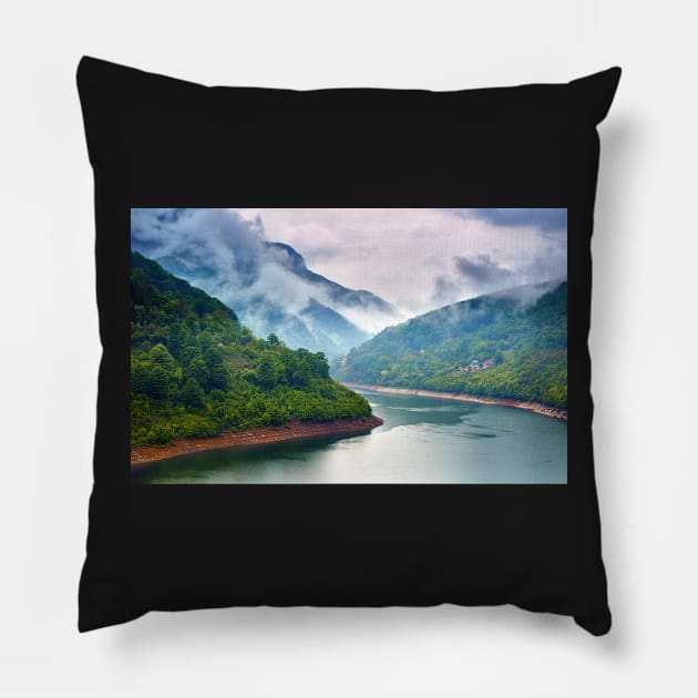 Lake in the mountains on a foggy day Pillow by naturalis