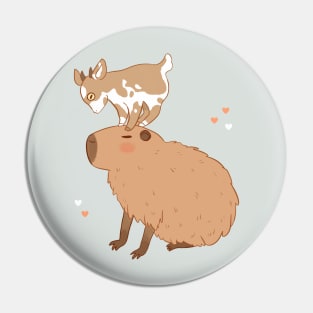 Cute capybara with a little goat friend on its head Pin