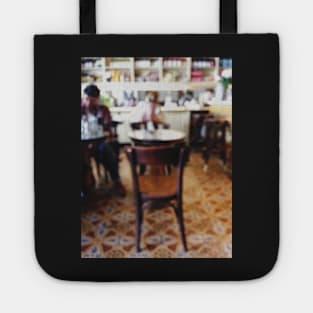 People in Italian Restaurant Out of Focus Tote