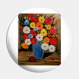 Some mixed flowers with metallic blue vase Pin