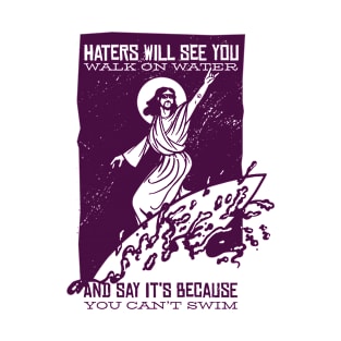 Surfing Jesus On the Ocean/ with Lettering Haters Will See You Walk On Water and Say Its Because You Swim T-Shirt