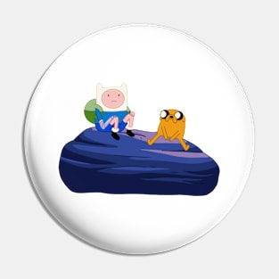 Finn and Jake on a rock Pin