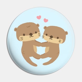 Cute Otters Holding Paws In Love Pin