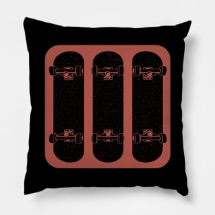 Three Skateboards on Red Pillow