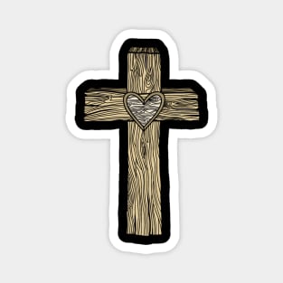 A wooden cross with a heart in the center Magnet