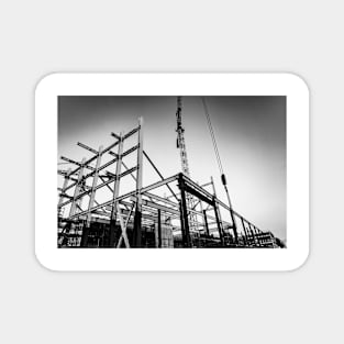 Gritty construction image of steel framing and construction crane Magnet