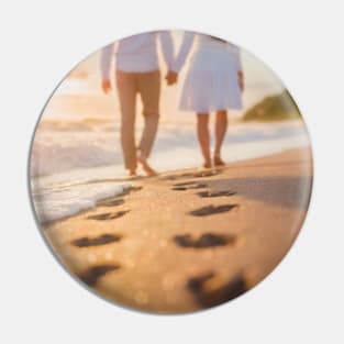 Handheld couple walking on the beach Pin