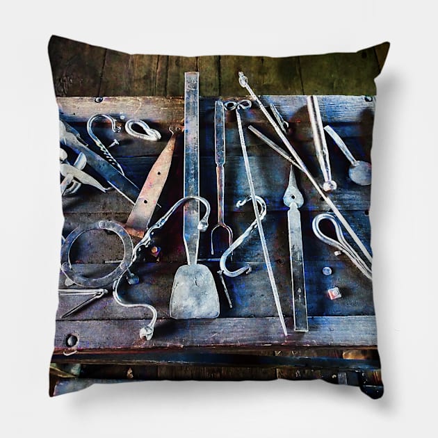 Blacksmith Tools on Table Pillow by SusanSavad