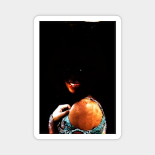 Special processing. Dark side. Girl with not visible face parts. Orange and blue. Magnet