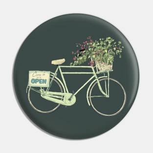 Pretty pastel green bicycle with a basket of flowers Pin