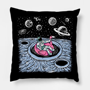 Funny Astronaut Floating in a Crater Pool on a Pink Flamingo Float Pillow