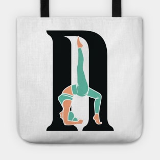 Sports yoga women in letter N Sticker design vector illustration. Alphabet letter icon concept. Sports young women doing yoga exercises with letter N sticker design logo icons. Tote