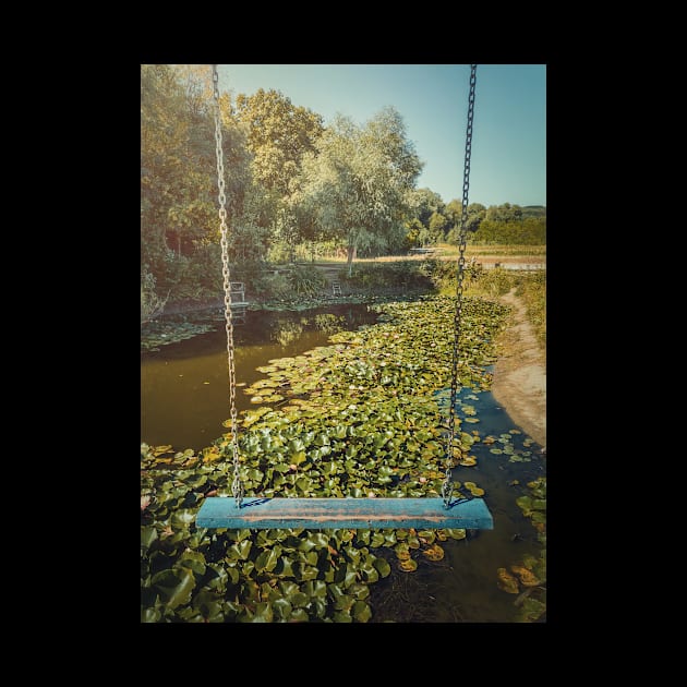 swing hanging over a waterlilies pond by psychoshadow