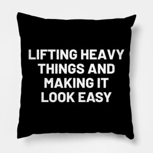 Lifting heavy things and making it look easy Pillow