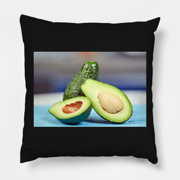 Fresh avocado on a table Pillow by naturalis