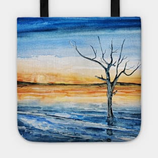 Lonely tree on the shore Tote