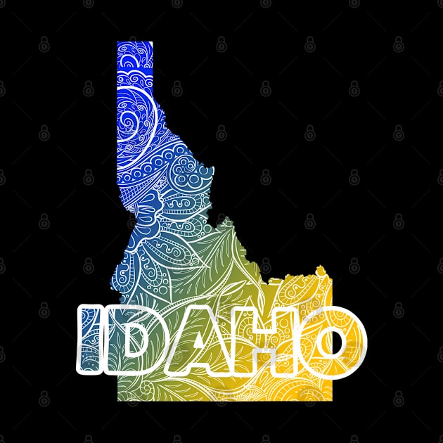 Colorful mandala art map of Idaho with text in blue and yellow by Happy Citizen