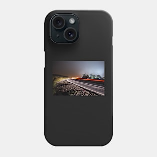 Foggy night on Ilkley Moor light trails on the road Phone Case