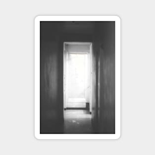 Digital collage, special processing. Room, corridor. Look from darkness to light. Grayscale. Magnet