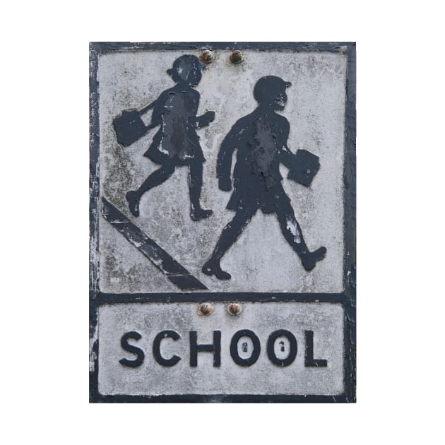 Old faded UK road sign for a school in Glastonbury by stevepaint