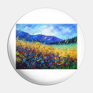 Blooming field near the mountains Pin